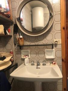 a bathroom with a sink and a mirror at Gressoney Saint Jean, Italy in Gressoney-Saint-Jean
