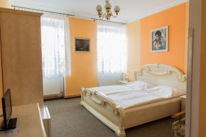 Postel nebo postele na pokoji v ubytování Penzion na Čertovce + 34 fotografií