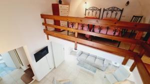 an overhead view of a bedroom with a bunk bed at Giada House in Porto Cesareo