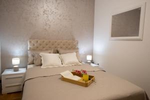 Postel nebo postele na pokoji v ubytování Apartman SUNSET