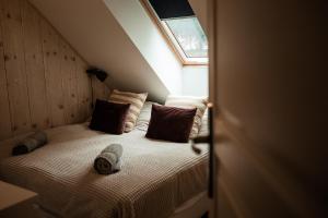Posteľ alebo postele v izbe v ubytovaní Válibor Vinotéka Apartman