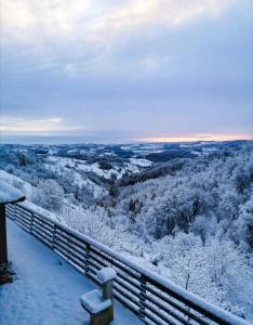 a view of a valley covered in snow at Wellness pod zvezdami, Maribor - PRIVATE in Maribor