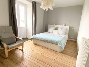 Postel nebo postele na pokoji v ubytování Villa la Korrigane vue mer cuisine privée