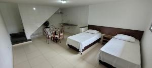 Sleep Suites客房内的一张或多张床位