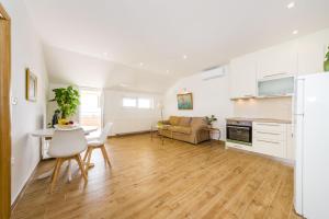 Kuchyň nebo kuchyňský kout v ubytování Apartment Alex 1