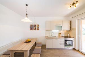 Kuchyň nebo kuchyňský kout v ubytování Apartment Alex 1