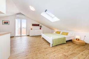 Postel nebo postele na pokoji v ubytování Apartment Alex 1
