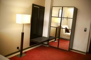 Łóżko lub łóżka w pokoju w obiekcie Hotel Astory Plzeň