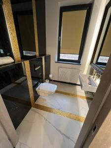 Phòng tắm tại Centrum Bankietowo - Hotelowe "Perła"