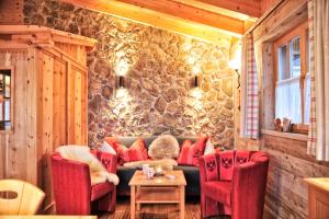 Posedenie v ubytovaní Luxury Chalets Wiesenruh