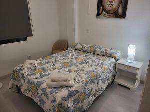 Ein Bett oder Betten in einem Zimmer der Unterkunft Virginia Apartment