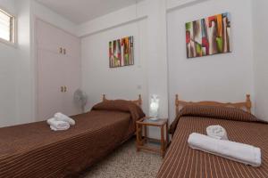 Ein Bett oder Betten in einem Zimmer der Unterkunft Virginia Apartment