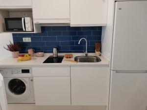 Kuchyňa alebo kuchynka v ubytovaní Bnbook Medea Apartments 2
