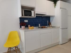 Kuchyňa alebo kuchynka v ubytovaní Bnbook Medea Apartments 2