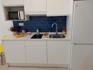 Kuchyňa alebo kuchynka v ubytovaní Bnbook Medea Apartments 2