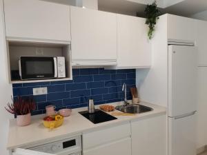 Kuchyňa alebo kuchynka v ubytovaní Bnbook Medea Apartments 2