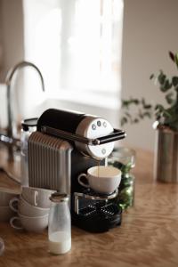 อุปกรณ์ชงชาและกาแฟของ MÜHLENHOF ROOMS boutique bed & breakfast