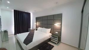Postel nebo postele na pokoji v ubytování Indico Executivo Hotel