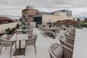 Reštaurácia alebo iné gastronomické zariadenie v ubytovaní Hotel Petit Luxe