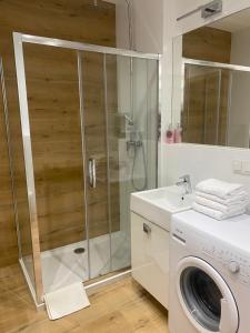 Koupelna v ubytování Apartamenty BRUNO i BIANCA w Symphony Modern Tower Gdynia 2 i 3 piętro + 26 fotografií