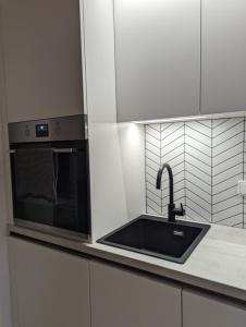 Kuchyň nebo kuchyňský kout v ubytování JASMIN HOME Apartments