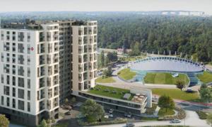 widok z powietrza na dwa budynki i stadion w obiekcie Apartamenty BRUNO i BIANCA w Symphony Modern Tower Gdynia 2 i 3 piętro w mieście Gdynia