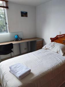 Cama o camas de una habitación en Apartamento Poblado - Loma del Indio