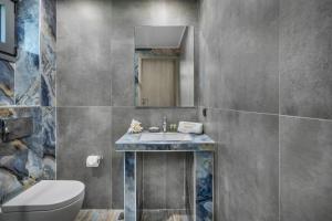 Ванная комната в NewStory Suites Possidi