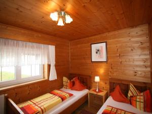 Postel nebo postele na pokoji v ubytování Apartment Comfortappart Eberharter by Interhome