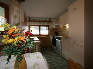 Kuchyň nebo kuchyňský kout v ubytování Apartment Comfortappart Eberharter by Interhome