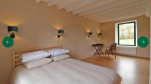 Ένα ή περισσότερα κρεβάτια σε δωμάτιο στο La demeure de Paule
