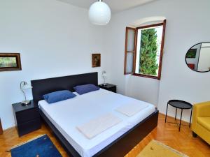 Postel nebo postele na pokoji v ubytování Holiday Home Stefan by Interhome