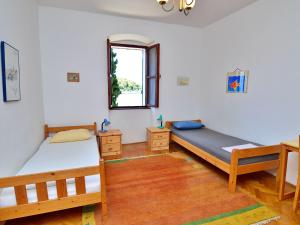 Postel nebo postele na pokoji v ubytování Holiday Home Stefan by Interhome
