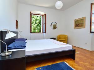Postel nebo postele na pokoji v ubytování Holiday Home Stefan by Interhome