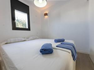 Posteľ alebo postele v izbe v ubytovaní Holiday Home Gunella by Interhome