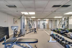 a gym with lots of treadmills and machines at Amazing Waterview Towers 104 Condo With Boat Slip in Destin