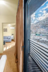Postel nebo postele na pokoji v ubytování LALO Hotel Abastumani
