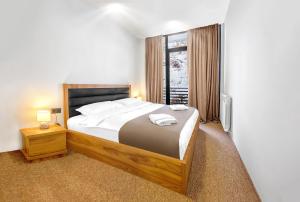 Voodi või voodid majutusasutuse LALO Hotel Abastumani toas