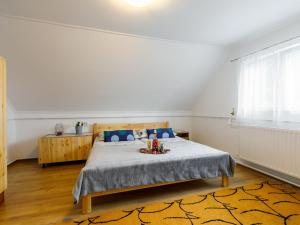 Ένα ή περισσότερα κρεβάτια σε δωμάτιο στο Holiday Home Pioneer by Interhome