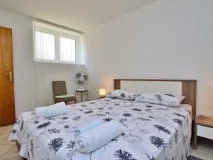 Posteľ alebo postele v izbe v ubytovaní Apartment Kira by Interhome