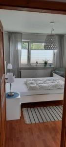 Cama ou camas em um quarto em Ferienhaus Diana