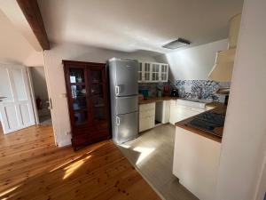 Kuchyň nebo kuchyňský kout v ubytování Apartmán U Březinů