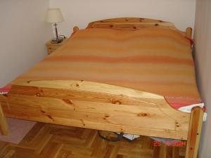 Ένα ή περισσότερα κρεβάτια σε δωμάτιο στο Apartments Bajan