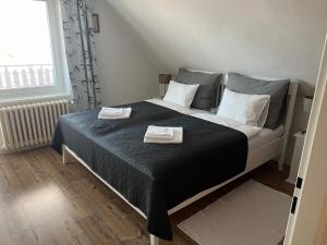 Postel nebo postele na pokoji v ubytování Apartmán U Březinů