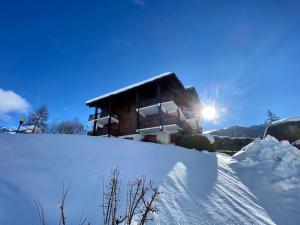 T2 de charme à Megeve vue panoramique tokom zime