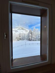 T2 de charme à Megeve vue panoramique tokom zime