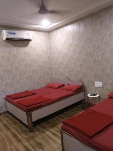 Postel nebo postele na pokoji v ubytování Sayeban Hotel