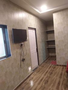 TV a/nebo společenská místnost v ubytování Sayeban Hotel