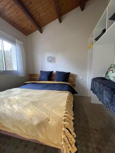 A bed or beds in a room at Domaine de la Presqu'île