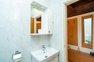 Koupelna v ubytování Apartment Joky